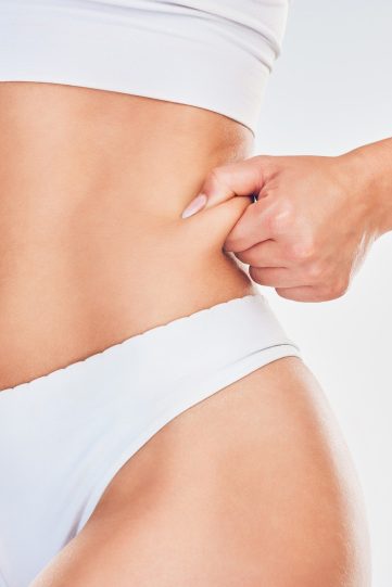 Health, body and wellness, skin and fat with diet and fitness, weightloss with exercise or liposuct